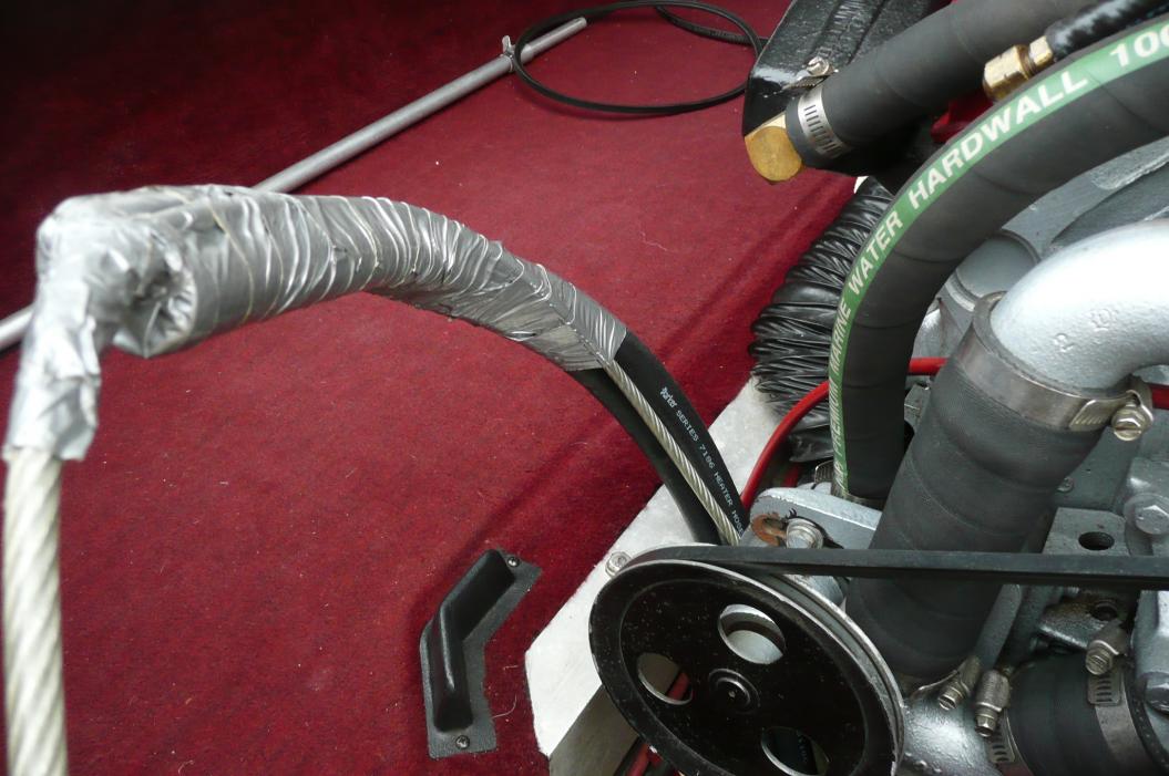 Click image for larger version

Name:	F - Pull the cable through bilge until hoses appear.jpg
Views:	1019
Size:	93.6 KB
ID:	372597
