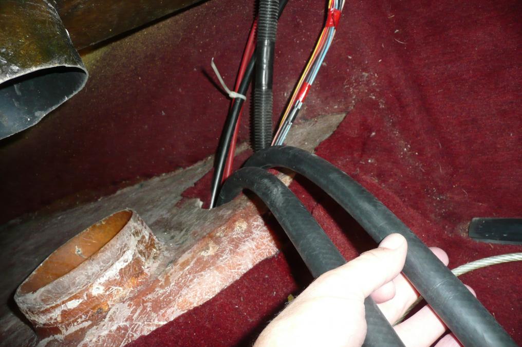 Click image for larger version

Name:	G - move hoses over to small opening.jpg
Views:	911
Size:	94.9 KB
ID:	372598
